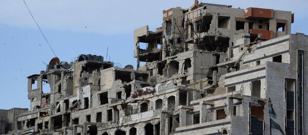 Вид на разрушенные дома в Хомсе. Архивное фото - Sputnik Кыргызстан
