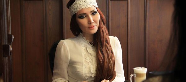 Звезда отечественного шоу-бизнеса, журналист и продюсер Ассоль Молдокматова во время интервью - Sputnik Кыргызстан