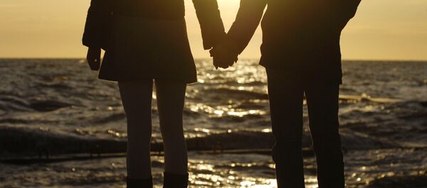 Кол кармашкан жубай. Архив - Sputnik Кыргызстан