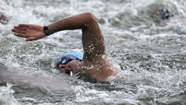 Пловец во время марафона. Архивное фото - Sputnik Кыргызстан