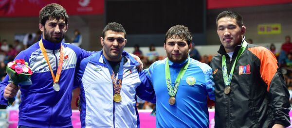 Борец из Кыргызстана Магомед Мусаев(первый слева) на соревнованиях. Архивное фото - Sputnik Кыргызстан