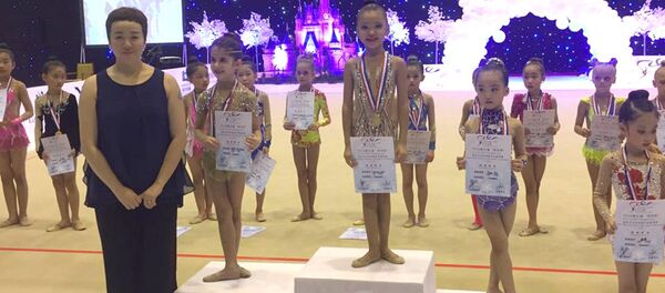 Гимнастка из Кыргызстана Эдель Касенова на международном турнире Zhong Ling Beijing Cup 2016 - Sputnik Кыргызстан