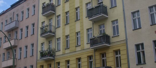 Многоэтажный жилой дом. Архивное фото Многоэтажный жилой дом. Архивное фото - Sputnik Кыргызстан