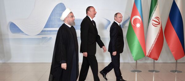 Президент России Владимир Путин, президент Азербайджанской Республики Ильхам Алиев и президент Исламской Республики Иран Хасан Рухани. Архивное фото - Sputnik Кыргызстан