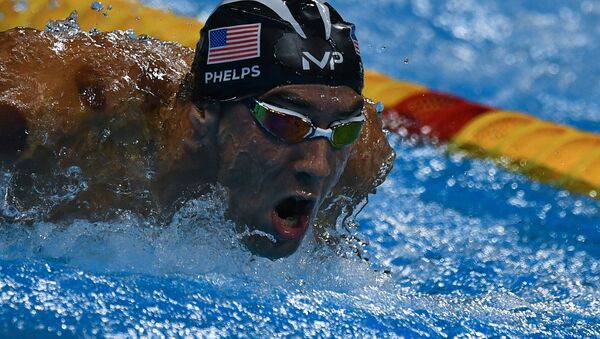 Майкл Фелпс (США) в полуфинальном заплыве на 200 м баттерфляем среди мужчин на XXXI летних Олимпийских играх. - Sputnik Кыргызстан