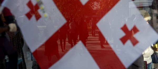 Флаг Грузии. Архивное фото Флаг Грузии. Архивное фото - Sputnik Кыргызстан