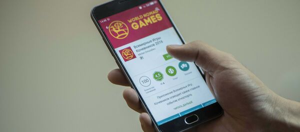 Официальное приложение Всемирных игр кочевников на экране мобильного телефона. Архивное фото - Sputnik Кыргызстан