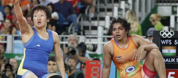 Борец из Кыгызстана в вольном стиле Айсулуу Тыныбекова на олимпийских играх в Рио-Де-Жанейро. Архивное фото - Sputnik Кыргызстан