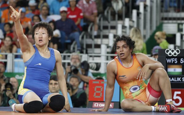 Айсулуу заняла пятое место на Олимпиаде, за что от правительства получит 800 тысяч сомов. - Sputnik Кыргызстан