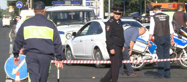 Сотрудники СК РФ работают на месте нападения на пост ГИБДД в Подмосковье Сотрудники СК РФ работают на месте нападения на пост ГИБДД в Подмосковье - Sputnik Кыргызстан