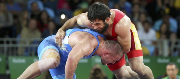 Рио-де-Жанейродогу Олимпиадада чейрек финал үчүн таймашкан Магомед Мусаев украиналык Валерий Андрейцевге 5:2 эсебинде утулуп калды. - Sputnik Кыргызстан