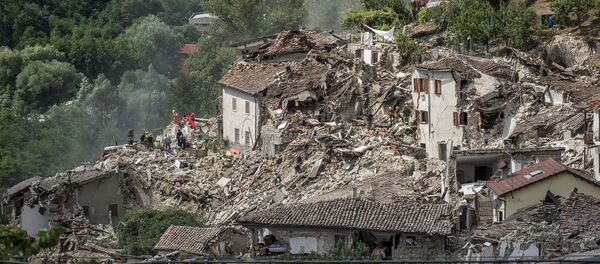 Италиянын Аматриче шаарындагы зилзаланын кесепети. Архив Италиянын Аматриче шаарындагы зилзаланын кесепети. Архив - Sputnik Кыргызстан