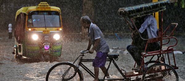 Последствия муссонных дождей в Нью-Дели Последствия муссонных дождей в Нью-Дели - Sputnik Кыргызстан