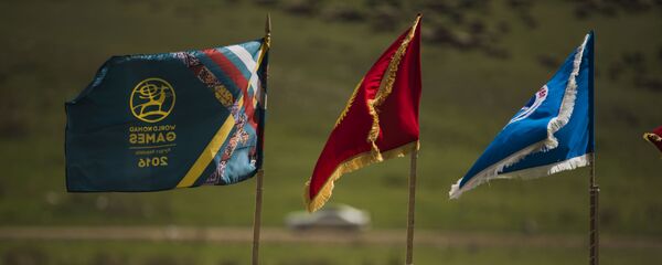 Флаг Кыргызстана и Всемирных игр кочевников на джайлоо Кырчын. Архивное фото - Sputnik Кыргызстан