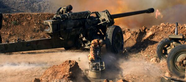 Сирийские военные ведут обстрел позиций исламистов в окрестностях города Эз-Забадани в Сирии. - Sputnik Кыргызстан