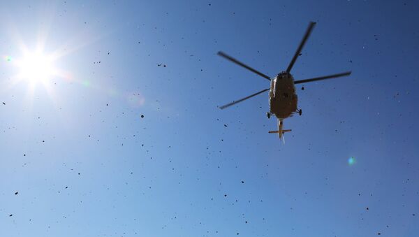 Вертолет в небе. Архивное фото - Sputnik Кыргызстан