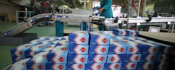 Коробки с сахаром на заводе, архивное фото Коробки с сахаром на заводе, архивное фото - Sputnik Кыргызстан