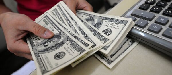 Работа обмена валюты в Ханое - Sputnik Кыргызстан