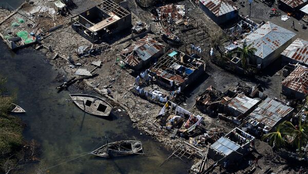 Разрушенные дома после урагана Мэтью в Корейл, Гаити - Sputnik Кыргызстан