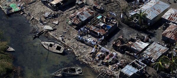 Разрушенные дома после урагана Мэтью в Корейл, Гаити Разрушенные дома после урагана Мэтью в Корейл, Гаити - Sputnik Кыргызстан
