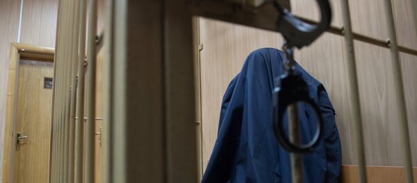 Подозреваемый в камере. Архивное фото Подозреваемый в камере. Архивное фото - Sputnik Кыргызстан