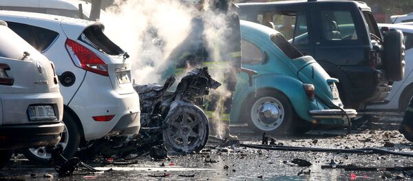Пожарная служба на месте взрыва на парковке рядом со зданием торгово-промышленной палаты (ТПП) в Анталье, Турция - Sputnik Кыргызстан