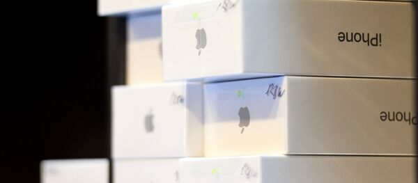 Новые смартфоны iPhone 7 и iPhone 7 Plus в коробках. Архивное фото - Sputnik Кыргызстан