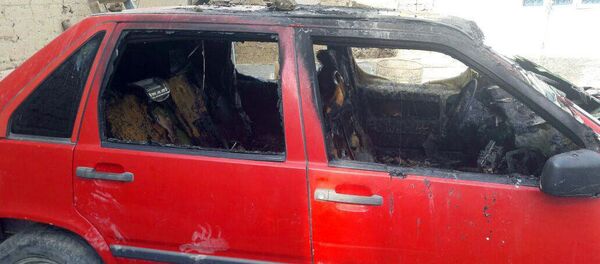Последствие пожара внутри салона автомобиля, где получил ожог ребенок двух лет в селе Жаны-Арык Ноокенского района - Sputnik Кыргызстан