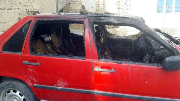 Последствие пожара внутри салона автомобиля, где получил ожог ребенок двух лет в селе Жаны-Арык Ноокенского района - Sputnik Кыргызстан