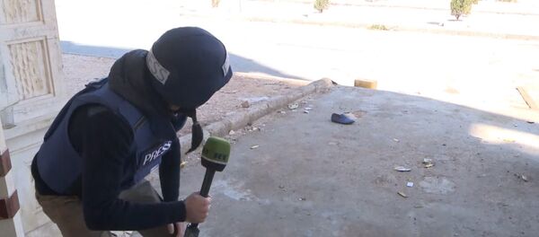 Съемочная группа RT под обстрелом боевиков в Алеппо. Момент инцидента - Sputnik Кыргызстан