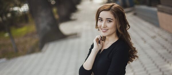 Кыргызстандык алып баруучу Рахат Божокоеванын архивдик сүрөтү - Sputnik Кыргызстан