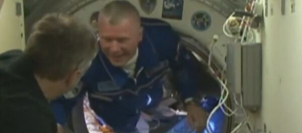 Встреча на орбите: экипаж корабля Союз МС-03 перешел на МКС - Sputnik Кыргызстан