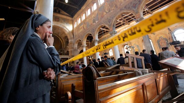 Последствия теракта в церкви в Каире - Sputnik Кыргызстан