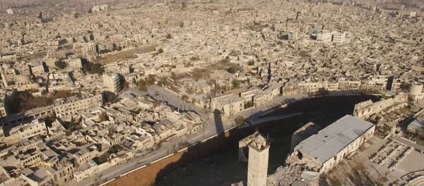 Районы вокруг цитадели в Алеппо после освобождения от боевиков. Съемка с дрона - Sputnik Кыргызстан