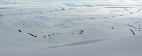 Принудительный спуск снежных лавин на автодороге Бишкек-Ош Принудительный спуск снежных лавин на автодороге Бишкек-Ош - Sputnik Кыргызстан