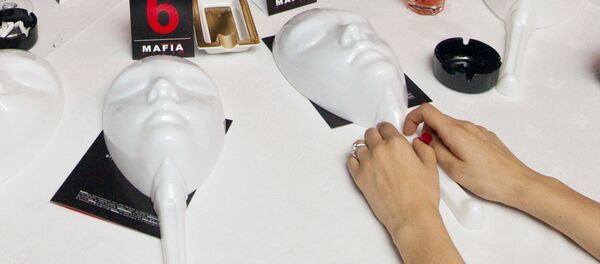 Во время интеллектуальной игры Мафия. Архивное фото - Sputnik Кыргызстан