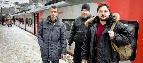 Участники группы наивные путешественники Робертс Вицупс, Валентин Роженцов и Алексей Стетюха . Архивное фото Участники группы наивные путешественники Робертс Вицупс, Валентин Роженцов и Алексей Стетюха . Архивное фото - Sputnik Кыргызстан