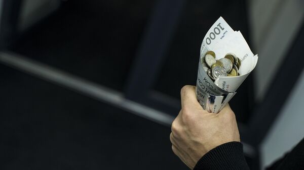 Кулек с деньгами. Архивное фото - Sputnik Кыргызстан