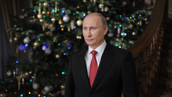 Премьер-министр РФ Владимир Путин поздравляет россиян с наступающим Новым годом - Sputnik Кыргызстан