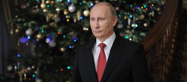 Премьер-министр РФ Владимир Путин поздравляет россиян с наступающим Новым годом - Sputnik Кыргызстан