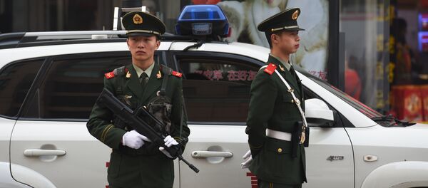 Сотрудники китайской полиции в Пекине - Sputnik Кыргызстан