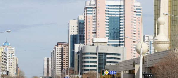 Жилые дома в Астане. Архивное фото Жилые дома в Астане. Архивное фото - Sputnik Кыргызстан