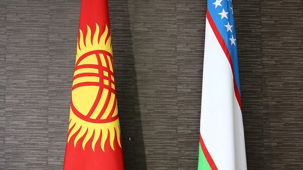 Флаги Узбекистана и Кыргызстана. Архивное фото - Sputnik Кыргызстан