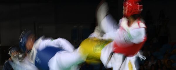 Спортсмены во время чемпионата по таэквондо WTF. Архивное фото - Sputnik Кыргызстан