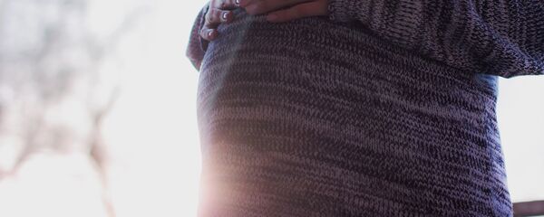 Беременная женщина. Архивное фото - Sputnik Кыргызстан