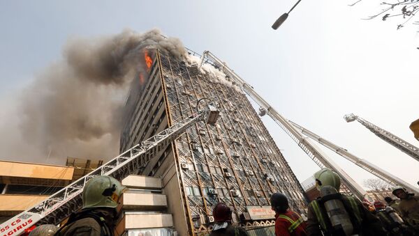 Обрушение 17-этажного торгового центра в Тегеране - Sputnik Кыргызстан