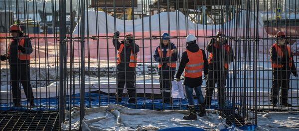 Рабочие на строительной площадке. Архивное фото - Sputnik Кыргызстан