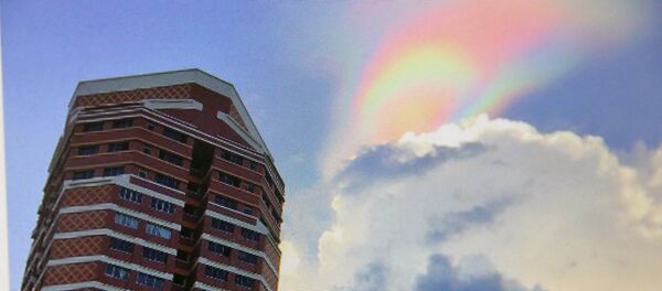 Огненная радуга в небе над Сингапуром. Фото со страницы Instagram пользователя luciuscjh Огненная радуга в небе над Сингапуром. Фото со страницы Instagram пользователя luciuscjh - Sputnik Кыргызстан