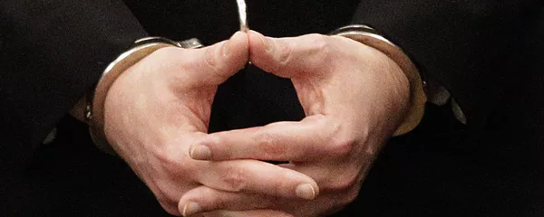 Мужчина в наручниках. Архивное фото - Sputnik Кыргызстан