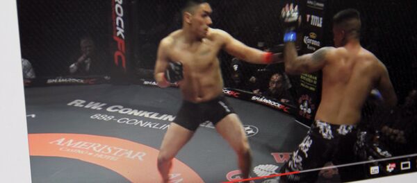 Поединок бойцов на турнире по смешанным единоборствам Shamrock FC 285. Фото со страницы Youtube пользователя Shamrock FC - Sputnik Кыргызстан